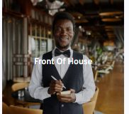 Waiting staff serving at a London event
